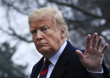 President Donald Trump walks on the South Lawn upon arrival at the White House in Washington, Saturday, Jan. 19, 2019, after attending the casualty return at Dover Air Force Base, Del., for the four Americans killed in a suicide bomb attack in Syria. (AP Photo/Manuel Balce Ceneta)