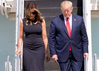 President Donald Trump and First Lady Melania Trump step off Air Force One at Wright-Patterson Air Force Base, Wednesday, Aug. 7, 2019, to visit Dayton, Ohio, following the mass shooting that left nine dead and 27 injured early Sunday morning. 

Trump Dayton 78