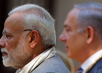 India's Prime Minister Narendra Modi and his Israeli counterpart Benjamin Netanyahu walk during their visit to Gandhi Ashram in Ahmedabad, India, January 17, 2018. REUTERS/Amit Dave - RC1CDFAC6A30