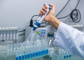 A lab worker prepares solutions for the manufacture of coronavirus diagnostic test kits at the TIB Molbiol Syntheselabor GmbH production facility in Berlin, Germany, on Thursday, March 6, 2020. TIB has reoriented its business toward coronavirus, running its machines through the night and on weekends to make the kits, which sell for about 160 ($180) apiece. Photographer: Krisztian Bocsi/Bloomberg via Getty Images