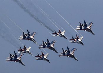 MOSCOW REGION, RUSSIA - JUNE 10, 2020: Mikoyan MiG-29UB fighter jets of the Strizhi [Swifts] aerobatic team and Sukhoi Su-30SM fighter jets of the Russkiye Vityazi [Russian Knights] aerobatic team fly in formation during a rehearsal of a military parade marking the 75th anniversary of the victory over Nazi Germany in World War II in Alabino. Russian President Vladimir Putin has postponed the Victory Day parade to June 24 due to the COVID-19 coronavirus pandemic. Sergei Bobylev/TASS

Ðîññèÿ. Ìîñêîâñêàÿ îáëàñòü. Àâèàãðóïïû "Ñòðèæè" íà ñàìîëåòàõ ÌèÃ-29ÓÁ è "Ðóññêèå Âèòÿçè" íà ñàìîëåòàõ Ñó-30ÑÌ âî âðåìÿ ñîâìåñòíîé òðåíèðîâêè ïåøèõ ðàñ÷åòîâ, ìåõàíèçèðîâàííîé êîëîííû è ïðîëåòà ïàðàäíîãî ñòðîÿ àâèàöèè â Àëàáèíî. Óêàçîì ïðåçèäåíòà ÐÔ Â.Ïóòèíà ïàðàä Ïîáåäû áûë ïåðåíåñåí íà 24 èþíÿ èç-çà ïàíäåìèè êîðîíàâèðóñà. Ñåðãåé Áîáûëåâ/ÒÀÑÑ