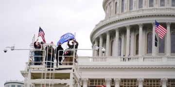 Trump supporters rally Wednesday, Jan. 6, 2021, at the Capitol in Washington. As Congress prepares to affirm President-elect Joe Biden's victory, thousands of people have gathered to show their support for President Donald Trump and his claims of election fraud. (AP Photo/Julio Cortez)