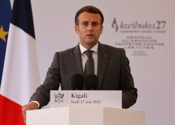 French President Emmanuel Macron delivers a speech during his visit to the Kigali Genocide Memorial, where some 250,000 victims of the massacres are buried, in Kigali on May 27, 2021. - French President Emmanuel Macron arrived in Rwanda on May 27, 2021, for a highly symbolic visit aimed at moving on from three decades of diplomatic tensions over France's role in the 1994 genocide in the country. Macron is the first French leader since 2010 to visit the East African nation, which has long accused France of complicity in the killing of some 800,000 mostly Tutsi Rwandans. (Photo by Ludovic MARIN / AFP) / RESTRICTED TO EDITORIAL USE - MANDATORY MENTION OF THE ARTIST UPON PUBLICATION - TO ILLUSTRATE THE EVENT AS SPECIFIED IN THE CAPTION