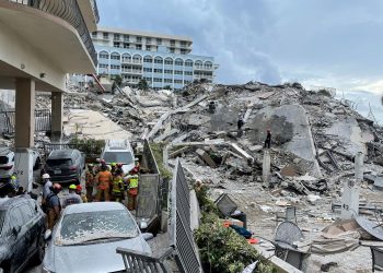 Emergency personnel continue to search at the site of a partially collapsed building in Surfside, near Miami Beach, Florida, U.S., June 25, 2021. Miami-Dade Fire Rescue Department/Handout via REUTERS