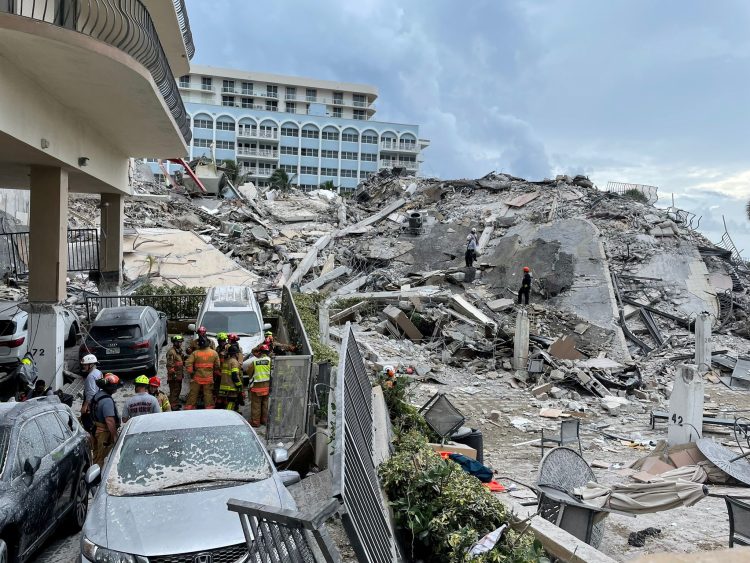 Emergency personnel continue to search at the site of a partially collapsed building in Surfside, near Miami Beach, Florida, U.S., June 25, 2021. Miami-Dade Fire Rescue Department/Handout via REUTERS