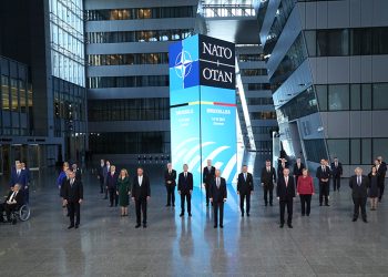 NATO leaders pose for a group photo during a NATO summit in Brussels, Monday, June 14, 2021. U.S. President Joe Biden is taking part in his first NATO summit, where the 30-nation alliance hopes to reaffirm its unity and discuss increasingly tense relations with China and Russia, as the organization pulls its troops out after 18 years in Afghanistan. (Yves Herman, Pool via AP)