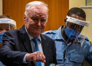 Former Bosnian Serb military leader Ratko Mladic stands prior to the pronouncement of his appeal judgement at the UN International Residual Mechanism for Criminal Tribunals (IRMCT) in The Hague, Netherlands June 8, 2021. Jerry Lampen/Pool via REUTERS