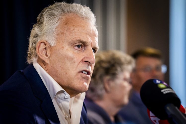 This photograph taken on June 23, 2021, shows Dutch crime reporter Peter R. de Vries as he addresses a press conference in Naarden. - A well-known Dutch crime reporter  was rushed to hospital with gunshot wounds on July 6, 2021, after being attacked in broad daylight in central Amsterdam. Peter R. de Vries, a journalist and TV presenter who regularly speaks on behalf of victims, was shot up to five times including once in the head, according to eyewitnesses. (Photo by Remko de Waal / ANP / AFP) / Netherlands OUT