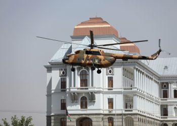 A helicopter carrying President Ashraf Ghani prepares to land at the Darul Aman Palace in Kabul, Afghanistan, Monday, Aug. 2, 2021. (AP Photo/Rahmat Gul)