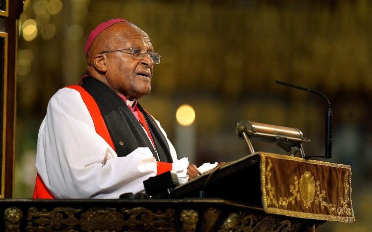 (FILES) In this file photo taken on March 03, 2014 South African Archbishop Desmond Tutu speaks during a memorial service for former South African president Nelson Mandela at Westminster Abbey in London. - South African anti-apartheid icon Desmond Tutu, described as the country's moral compass, died on December 26, 2021, aged 90, President Cyril Ramaphosa said. (Photo by JOHN STILLWELL / POOL / AFP)