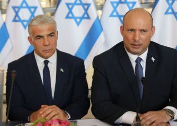 Israeli Prime Minister Naftali Bennett (R) and Foreign Minister Yair Lapid, attend a weekly cabinet meeting in Jerusalem, on May 29, 2022. (Photo by GIL COHEN-MAGEN / POOL / AFP) (Photo by GIL COHEN-MAGEN/POOL/AFP via Getty Images)