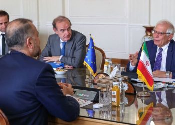 Iran's Foreign Minister Hossein Amir-Abdollahian (L) meets Josep Borell, the High Representative of the European Union for Foreign Affairs and Security Policy (R), as Deputy Secretary General of the European External Action Service (EEAS) Enrique Mora (C) looks on, at the foreign ministry headquarters in Iran's capital Tehran on June 25, 2022. - European Union foreign policy chief Josep Borrell met Iran's top diplomat today after arriving for talks on efforts to revive the 2015 Iran nuclear deal. Borrell flew in to Tehran on Friday night for a surprise visit aimed at getting the talks back on track three months after they stalled in March amid differences between Iran and the United States. (Photo by ATTA KENARE / AFP) (Photo by ATTA KENARE/AFP via Getty Images)