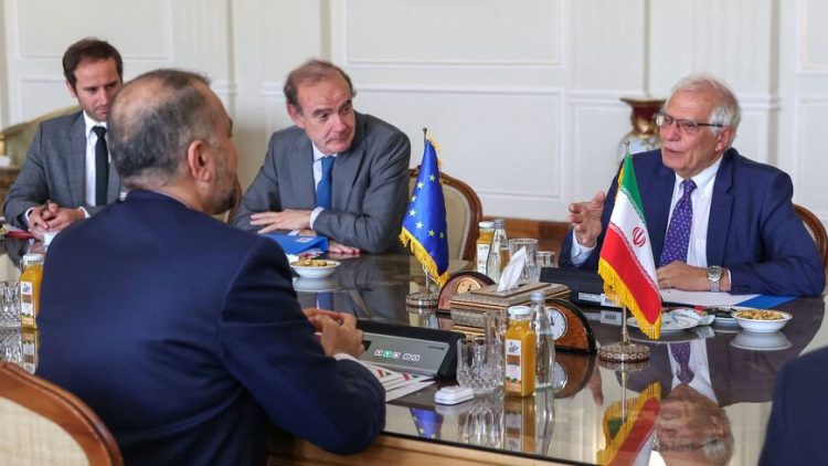 Iran's Foreign Minister Hossein Amir-Abdollahian (L) meets Josep Borell, the High Representative of the European Union for Foreign Affairs and Security Policy (R), as Deputy Secretary General of the European External Action Service (EEAS) Enrique Mora (C) looks on, at the foreign ministry headquarters in Iran's capital Tehran on June 25, 2022. - European Union foreign policy chief Josep Borrell met Iran's top diplomat today after arriving for talks on efforts to revive the 2015 Iran nuclear deal. Borrell flew in to Tehran on Friday night for a surprise visit aimed at getting the talks back on track three months after they stalled in March amid differences between Iran and the United States. (Photo by ATTA KENARE / AFP) (Photo by ATTA KENARE/AFP via Getty Images)