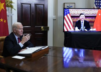 FILE - President Joe Biden meets virtually with Chinese President Xi Jinping from the Roosevelt Room of the White House in Washington, on Nov. 15, 2021.  (AP Photo/Susan Walsh, File)