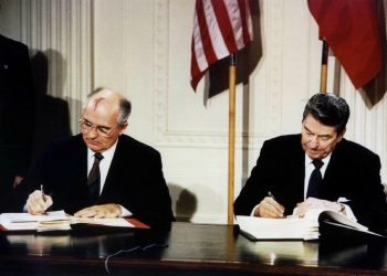 FILE PHOTO: Late U.S. President Ronald Reagan (R) and former Soviet leader Mikhail Gorbachev sign the Intermediate-Range Nuclear Forces (INF) treaty in the White House, December 8, 1987.