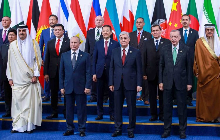 Kazakhstan. Astana. OCTOBER 13, 2022. Emir of Qatar Tamim bin Hamad Al Thani, Russia's President Vladimir Putin, Kazakhstans President Kassym-Jomart Tokayev and Turkey's President Recep Tayyip Erdogan (L-R front) and other leaders of CICA member states and international organisations are seen during a photo session at the 6th summit of the Conference on Interaction and Confidence-Building Measures in Asia (CICA) at Independence Palace in Astana. 
THIS IMAGE WAS PROVIDED BY A THIRD PARTY. EDITORIAL USE ONLY Kazakhstan President Press Office/TASS

Êàçàõñòàí. Àñòàíà. Ýìèð Êàòàðà øåéõ Òàìèì áèí Õàìàä Àëü Òàíè, ïðåçèäåíò ÐÔ Âëàäèìèð Ïóòèí, ïðåçèäåíò Êàçàõñòàíà Êàñûì-Æîìàðò Òîêàåâ è ïðåçèäåíò Òóðöèè Ðåäæåï Òàéèï Ýðäîãàí (íà ïåâðîì ïëàíå ñëåâà íàïðàâî) íà öåðåìîíèè ñîâìåñòíîãî ôîòîãðàôèðîâàíèÿ ãëàâ äåëåãàöèé ãîñóäàðñòâ è ìåæäóíàðîäíûõ îðãàíèçàöèé, ïðèíèìàþùèõ ó÷àñòèå â VI ñàììèòå Ñîâåùàíèÿ ïî âçàèìîäåéñòâèþ è ìåðàì äîâåðèÿ â Àçèè (ÑÂÌÄÀ) âî Äâîðöå Íåçàâèñèìîñòè. Ïðåññ-ñëóæáà ïðåçèäåíòà Ðåñïóáëèêè Êàçàõñòàí/ÒÀÑÑ

ÏÐÅÄÎÑÒÀÂËÅÍÎ ÒÐÅÒÜÅÉ ÑÒÎÐÎÍÎÉ. ÒÎËÜÊÎ ÄËß ÐÅÄÀÊÖÈÎÍÍÎÃÎ ÈÑÏÎËÜÇÎÂÀÍÈß