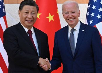 TOPSHOT - US President Joe Biden (R) and China's President Xi Jinping (L) shake hands as they meet on the sidelines of the G20 Summit in Nusa Dua on the Indonesian resort island of Bali on November 14, 2022. (Photo by SAUL LOEB / AFP) (Photo by SAUL LOEB/AFP via Getty Images)