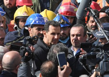 Syrian President Bashar al-Assad (C) visits neighbourhoods affected by an earthquake in the northern city of Aleppo, on February 10, 2023. - Almost 22,000 people are confirmed dead across Turkey and Syria in one of the worst disasters to hit the region in a around a century. More than 3,300 of them have been killed in Syria, according to health ministry figures and a rescue group. (Photo by AFP) (Photo by -/AFP via Getty Images)