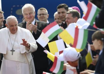 Pope Francis greets well-wishers as he arrives at the international airport in Budapest, Hungary, April 28, 2023. The pope was beginning a three-day trip to Hungary's capital. (CNS photo/Vatican Media)