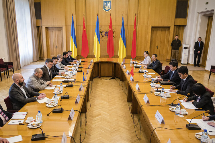 In this photo provided by the Ukrainian Foreign Ministry Press Office, Ukrainian Foreign Minister Dmytro Kuleba, center left, and Li Hui, Chinese envoy, center right, during their talks in Kyiv, Ukraine, Wednesday, May 17, 2023. (Ukrainian Foreign Ministry Press Office via AP)