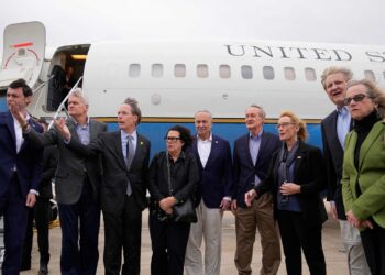 US Senate Majority Leader Chuck Schumer, US Senator Mike Crapo and other members of the delegation arrive at Shanghai Pudong International Airport in Shanghai on October 7, 2023. (Photo by ALY SONG / POOL / AFP)