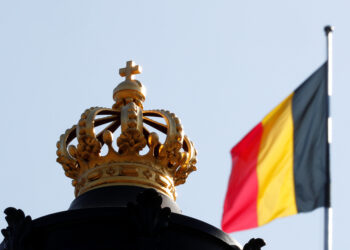 FILE PHOTO: The Belgian flag is seen outside Brussels Royal Palace during negotiations to form a government, in Brussels Belgium September 21, 2020. REUTERS/Francois Lenoir