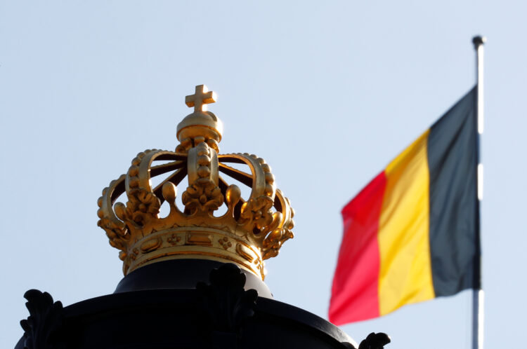 FILE PHOTO: The Belgian flag is seen outside Brussels Royal Palace during negotiations to form a government, in Brussels Belgium September 21, 2020. REUTERS/Francois Lenoir