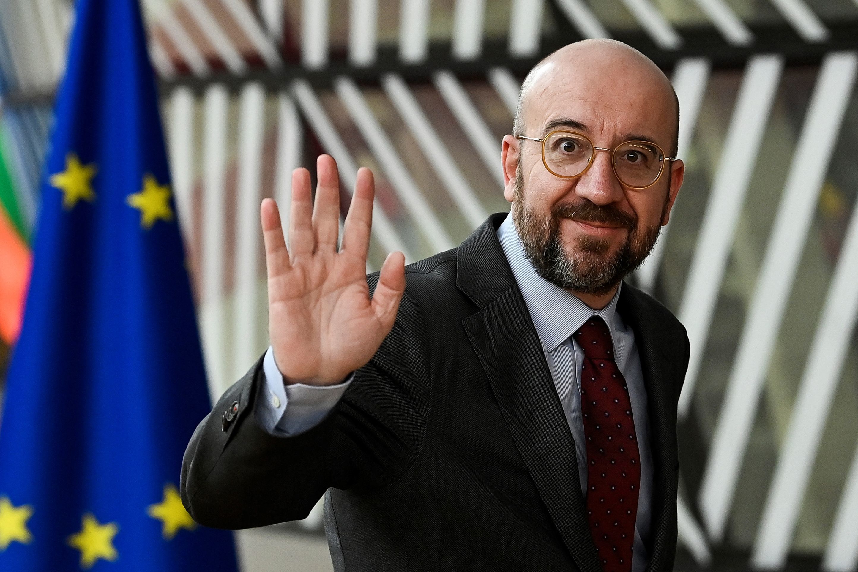 (FILES) President of the European Council Charles Michel waves as he arrives to attend a summit at EU parliament in Brussels, on February 9, 2023. Charles Michel has announced on January 7, 2024 he will step down as European Council president after running in the European Parliament elections set for June. (Photo by JOHN THYS / AFP)