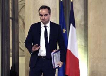 FILE - French Defense Minister Sebastien Lecornu waits at the Elysee Palace Thursday, Jan. 26, 2023 in Paris. Russian forces threatened to shoot down French flights patrolling last month in international airspace over the Black Sea, signals of a "particularly aggressive" posture from Moscow as its invasion of Ukraine struggles to make headway, France's defense minister said Thursday, Feb.22, 2024. (AP Photo/Aurelien Morissard, File)