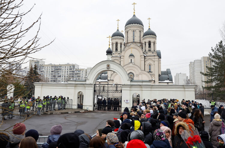 People gather outside the Soothe My Sorrows church as they wait for a funeral service and a farewell ceremony for Russian opposition politician Alexei Navalny in Moscow, Russia, March 1, 2024. REUTERS/Stringer