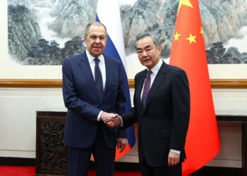 Russia's Foreign Minister Sergei Lavrov shakes hands with China's Foreign Minister Wang Yi during a meeting in Beijing, China April 9, 2024. Russian Foreign Ministry/Handout via REUTERS