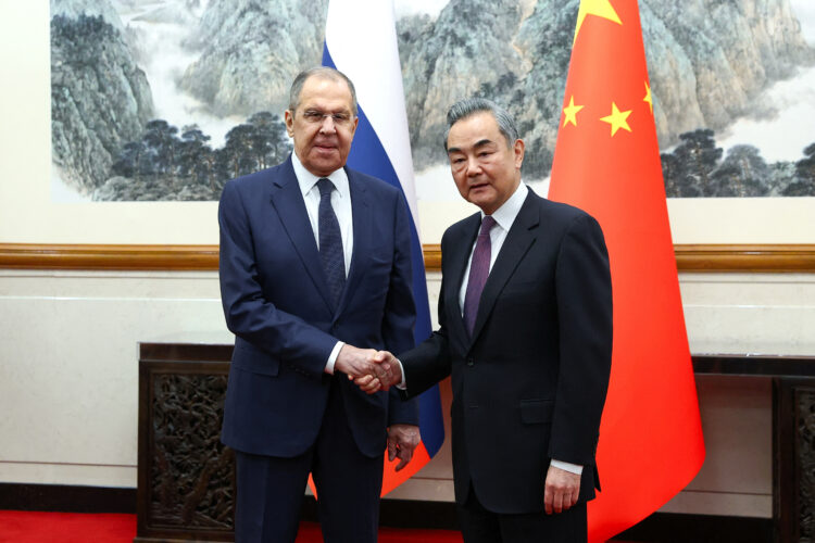 Russia's Foreign Minister Sergei Lavrov shakes hands with China's Foreign Minister Wang Yi during a meeting in Beijing, China April 9, 2024. Russian Foreign Ministry/Handout via REUTERS