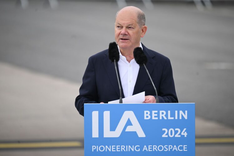 05 June 2024, Brandenburg, Schoenefeld: Germany's Chancellor Olaf Scholz speaks during the opening tour of the International Aerospace Exhibition (ILA) on the grounds of Berlin Brandenburg Airport (BER). Photo: Sebastian Christoph Gollnow/dpa