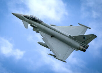 A Typhoon fighter jet in the skies above the Amari Airbase in Estonia. Here a squadron of RAF Typhoon jets are deployed on Operation Azotize the UK's commitment to NATO's Baltic Air policing mission. Picture date: Thursday July 27, 2023. PA Photo. This year's deployment began in March 2023. The RAF has conducted an annual NATO air policing mission since the NATO Warsaw Summit of 2014. See PA story DEFENCE Estonia. Photo credit should read: Jane Barlow/PA Wire