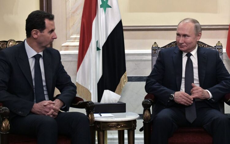 Russian President Vladimir Putin and Syrian President Bashar al-Assad hold a meeting in Damascus on January 7, 2020. - Putin met his Syrian counterpart Bashar al-Assad during an unprecedented visit to Damascus as the prospect of war between Iran and the United States loomed over the region. (Photo by Alexey NIKOLSKY / SPUTNIK / AFP) (Photo by ALEXEY NIKOLSKY/SPUTNIK/AFP via Getty Images)