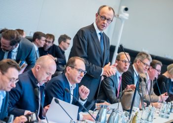 14 March 2025, Berlin: Friedrich Merz (C), leader of the Christian Democratic Union of Germany (CDU)/Christian Social Union in Bavaria (CSU) parliamentary group, speaks at the start of the parliamentary group meeting in the Bundestag. After lengthy discussions, the parliamentary group leaders of the CDU/CSU, SPD, and Greens have reached an agreement on a billion-euro defense and infrastructure package. Photo: Michael Kappeler/dpa