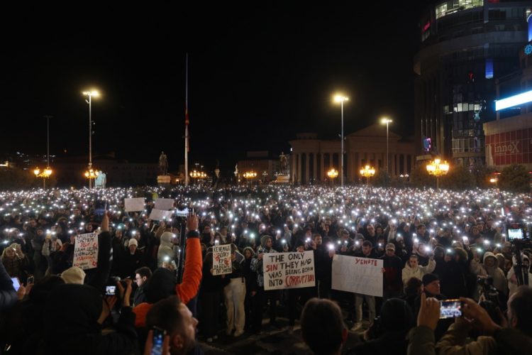 epa11972450 People hold up their phones with the light turned on during a rally for the victims who lost their lives in the Kocani night club fire, in Skopje, North Macedonia, 18 March 2025. The fire at a discotheque in Kocani in the early hours of 16 March 2025 claimed the lives of at least 59 people and left over 100 injured, according to initial reports from the Directorate for Protection and Rescue and the Center for Crisis Management.  EPA-EFE/GEORGI LICOVSKI